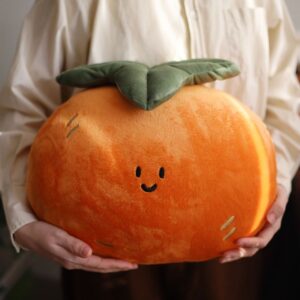 หมอนฟักทองยิ้ม สีส้มสด